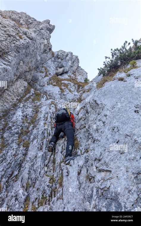 Climber On Mountain In Piatra Craiului Mountains Romania Stock Photo