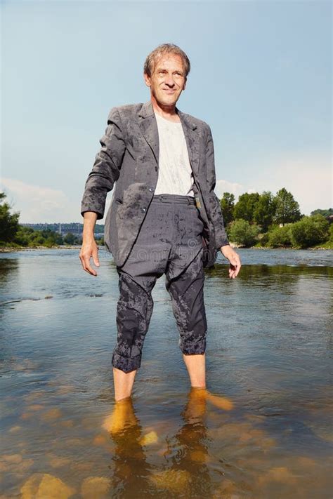 Older Manager In Suit Fighting With Hot Day In Running River Water Stock Image Image Of Suit