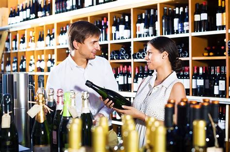 Couple Buying Bottle of Wine | Capiche Wine Marketing & PR