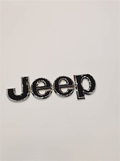 Jeep Logo Metal Xtreme Auto Mart