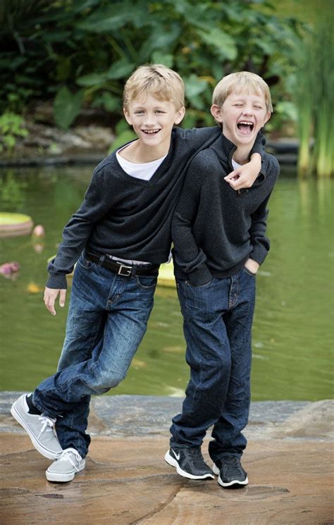 Tamara Lackey Photo Of Two Brothers Looking At The Camera For The