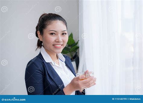 Beautiful Mature Woman Drinking A Cup Of Tea In Her Office Wit Stock Image Image Of Woman