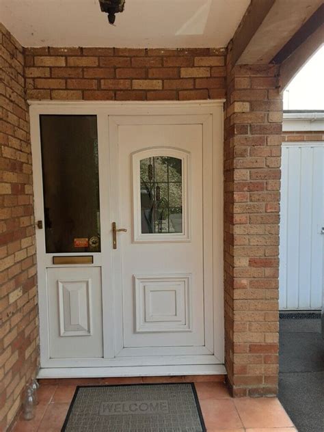 White Upvc Double Glazed Front Door With Side Panel Stained Glass And