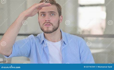 Portrait Of Young Man Looking Around Searching Stock Image Image Of