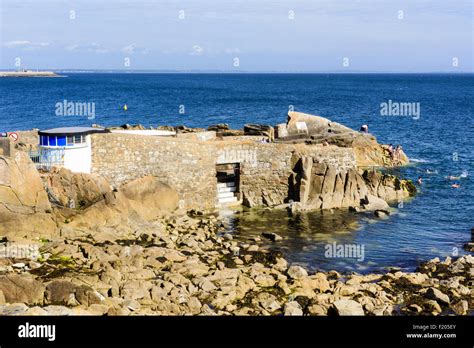 People Swimming At Forty Foot Bathing Place Sandycove Dun Laoghaire