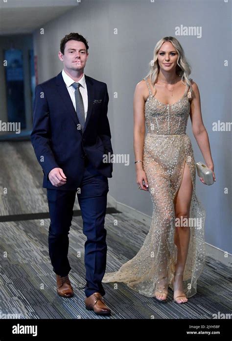 Lachie Neale Of The Lions And His Wife Julie Neale Are Seen Arriving