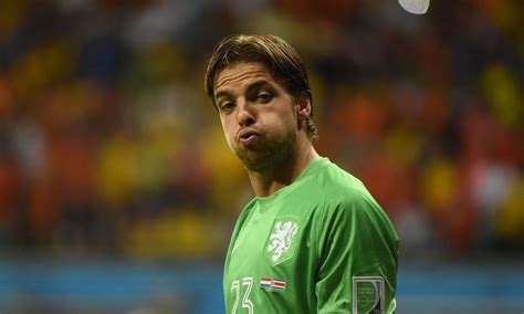 Substitute goalkeeper Tim Krul stops two shots in the penalty shootout ...