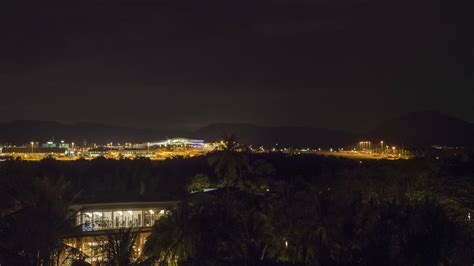 Airfield, panoramic view. Airport illuminated by lights. Airport view ...