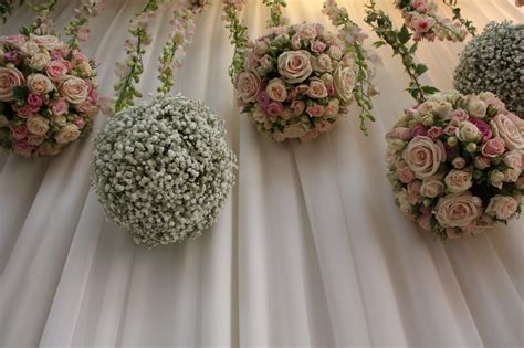 Hanging Flower Balls With Trailing Orchids And Ivy Gypso And Rose