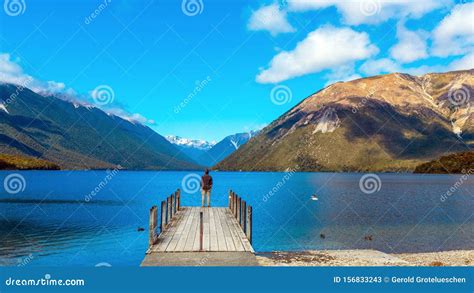 Man On The Pier Rotoiti River Nelson Lakes National Park New Zealand