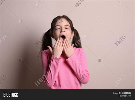 Little Girl Yawning