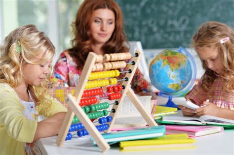 Teacher With Two Girls Stock Image Image Of Elementary 108158849