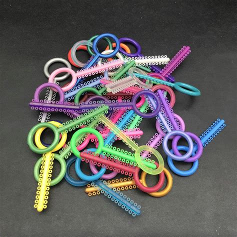 Cheap 40stick 1 Bag Dental Elastomeric Ligature Ties Orthodontic Elastic Rubber Band Teeth Ring