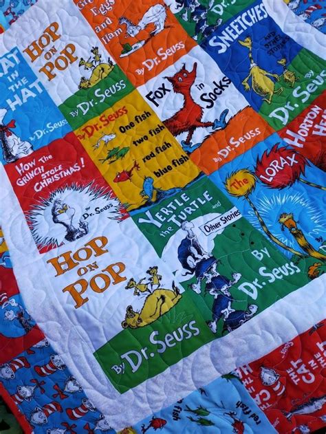 The Dr Seuss Baby Quilt Is Made With Many Different Colors And Designs