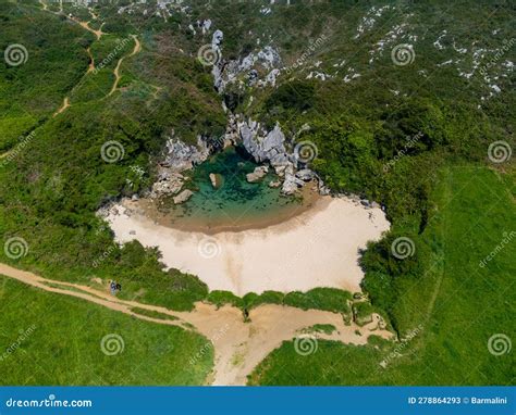 Aerial View Playa De Gulpiyuri Flooded Sinkhole With Inland Beach