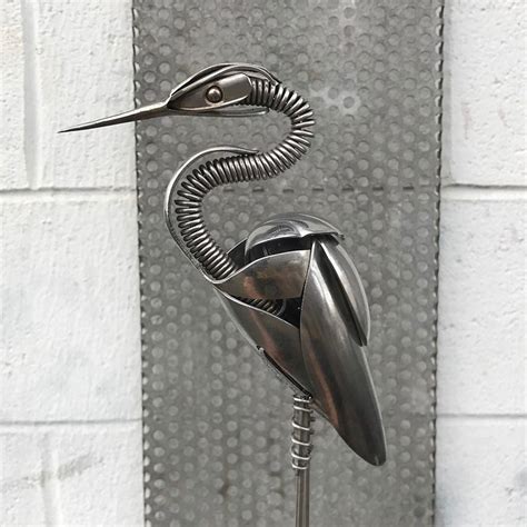 Artist Turns Unwanted Scrap Metal Into Magnificent Bird Sculptures