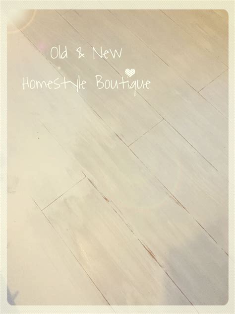 Beautifully Distressed Laminate Floor With Chalk Paint