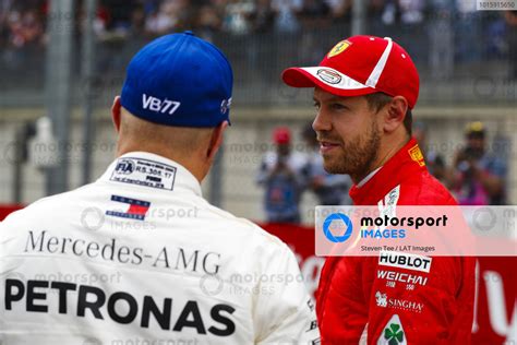 Sebastian Vettel Ferrari Talks To Pole Sitter Valtteri Bottas