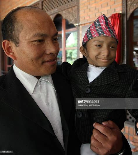 Nepalese teenager Khagendra Thapa Magar arrives at a press conference ...