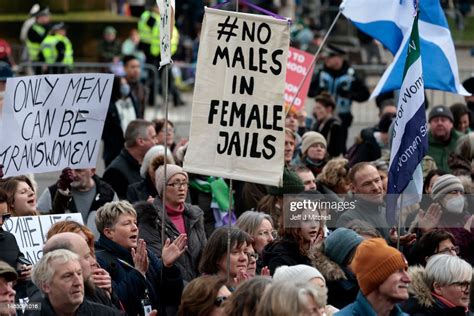 Members Of The Public Attend A Standing For Women Protest Attended By