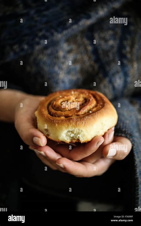 Woman Hold A Kanelbullar Swedish Cinnamon Rolls Stock Photo Alamy