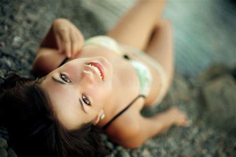 Playful Brunette Model Lying On The Beach Stock Image Image Of Model Lovely