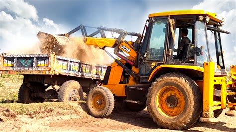 New Jcb 3dx Backhoe Machine Loading Mud In Mahindra 475 Di Tractor