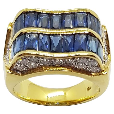 Blue Sapphire With Diamond Ring Set In 18 Karat Gold Settings For Sale