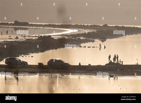 Odessa, Ukraine. 21st Oct, 2023. People sitting in the evening light on ...