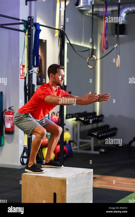 Man Doing Box Jumps In A Gym Stock Photo Alamy