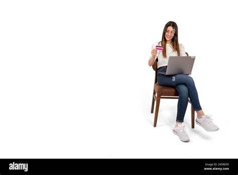 Using Laptop And Credit Card Caucasian Brunette Girl Using Laptop And