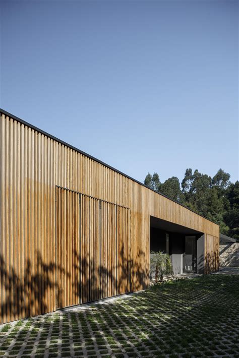 Wood Slats On The Exterior Of This House Hide Some Windows And Doors