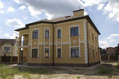 Отделка фасада декоративной штукатуркой