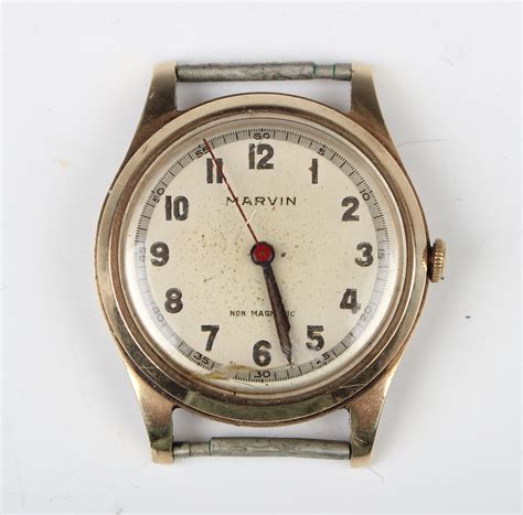 A Marvin Ct Gold Circular Cased Gentleman S Wristwatch With Signed And