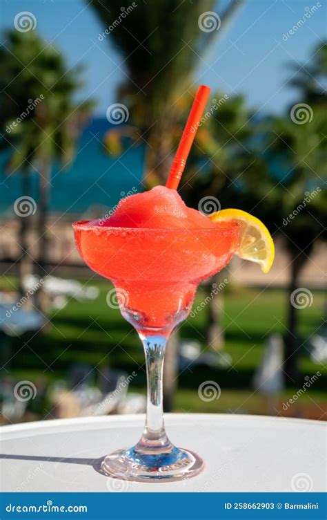 Colourful Cold Strawberry Daiquiri Cocktail Drink Served In Glass At