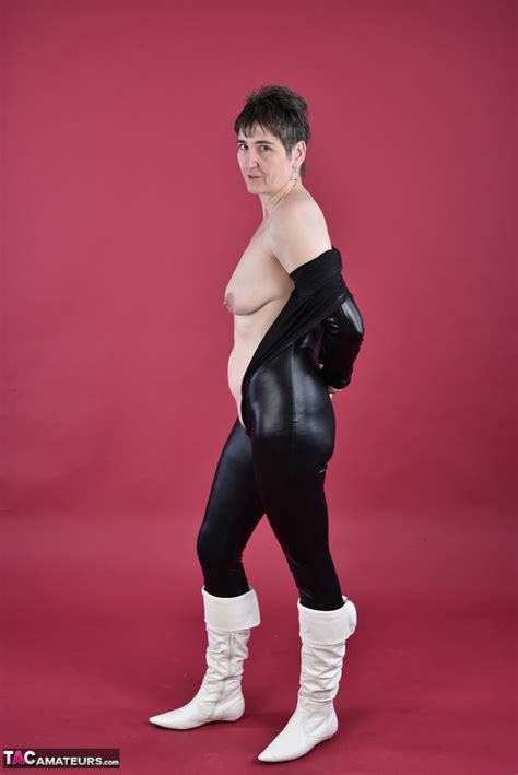 Solo Model Hot MILF Unzips A Catsuit To Expose Her Tits And Twatin