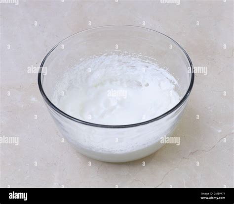 Beating egg whites until stiff Stock Photo - Alamy