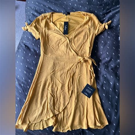 Lulus Dresses Lulus My Philosophy Golden Yellow Wrap Dress Poshmark