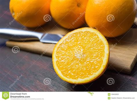 Juicy Orange Cut In Half To Make Orange Juice For Breakfast Stock