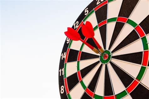 Premium Photo Dart Arrow Hitting To Center On Bullseye Dartboard Is