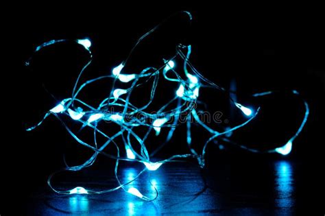 Glowing Blue Garland On Black Background Stock Image Image Of Concept
