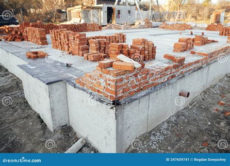 Bricks Masonry With Cement On Concrete Foundation Process Of House