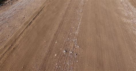 Premium Photo A Road In The Countryside After Rain Landslides