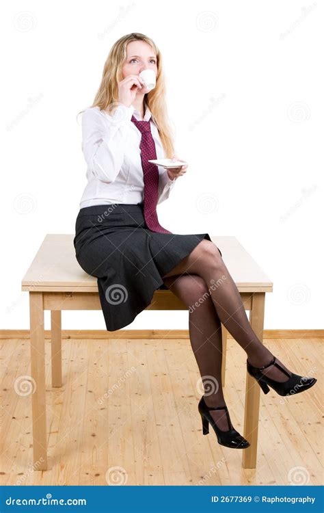 A Woman Sitting On A Table Royalty Free Stock Images Image 2677369