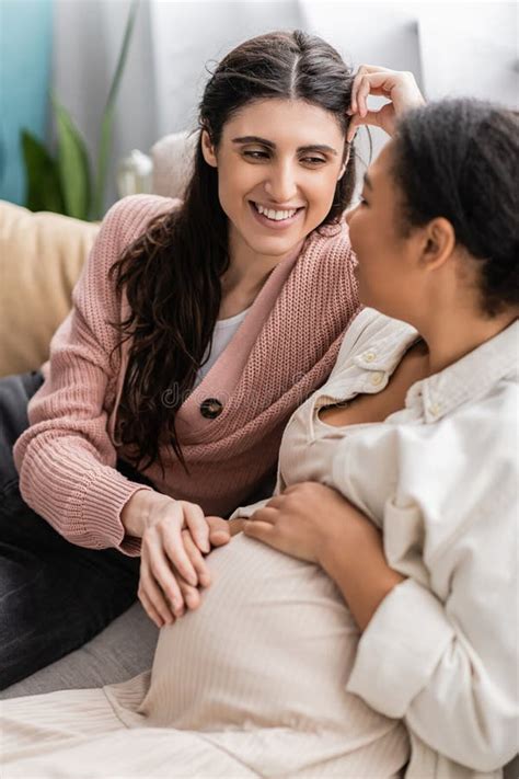 Happy Lesbian Couple Hugging Each Other And Looking Aside Stock Image Image Of People
