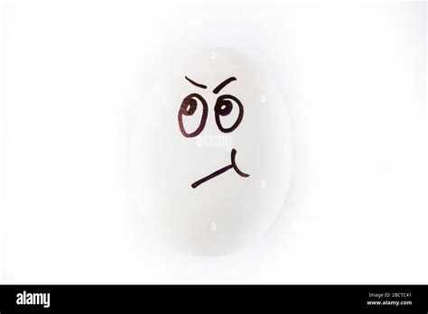 Funny sulky drawn face on Easter egg Stock Photo - Alamy