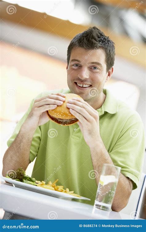 Man Eating Lunch At A Cafe Stock Photo Image Of Colour 8688274
