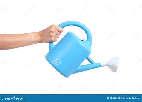 Woman Hand Holding A Watering Can Royalty Free Stock Photography