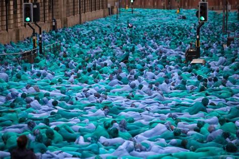 Thousands Of Naked Blue People Flood City Streets For Dramatic