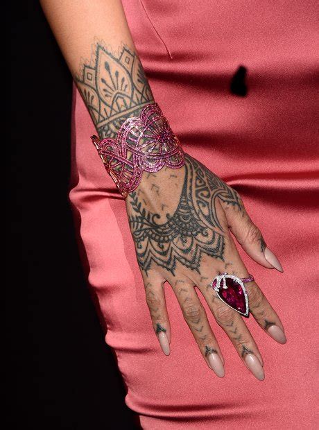 Her Henna Style Tatt On Her Hand A Guide To Rihannas Tattoos Her 25 Capital Xtra